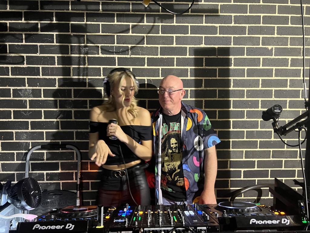 AMPT Australia sharing the DJ booth with a party guest
