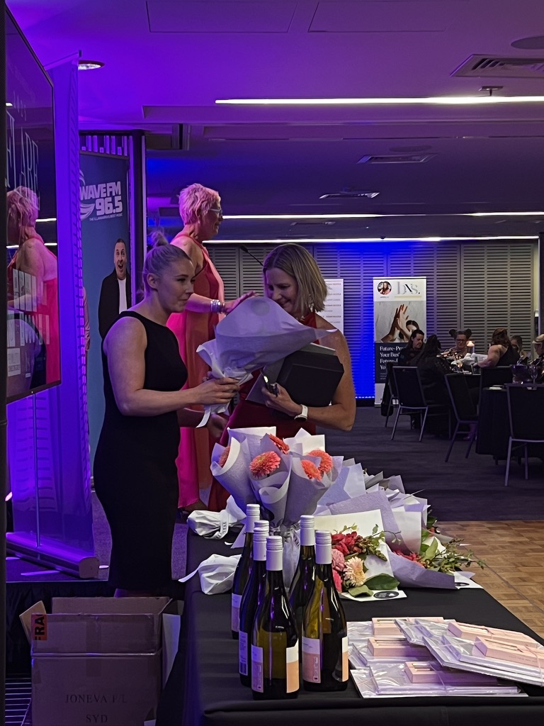 Flare Awards presentation with bouquets and prizes