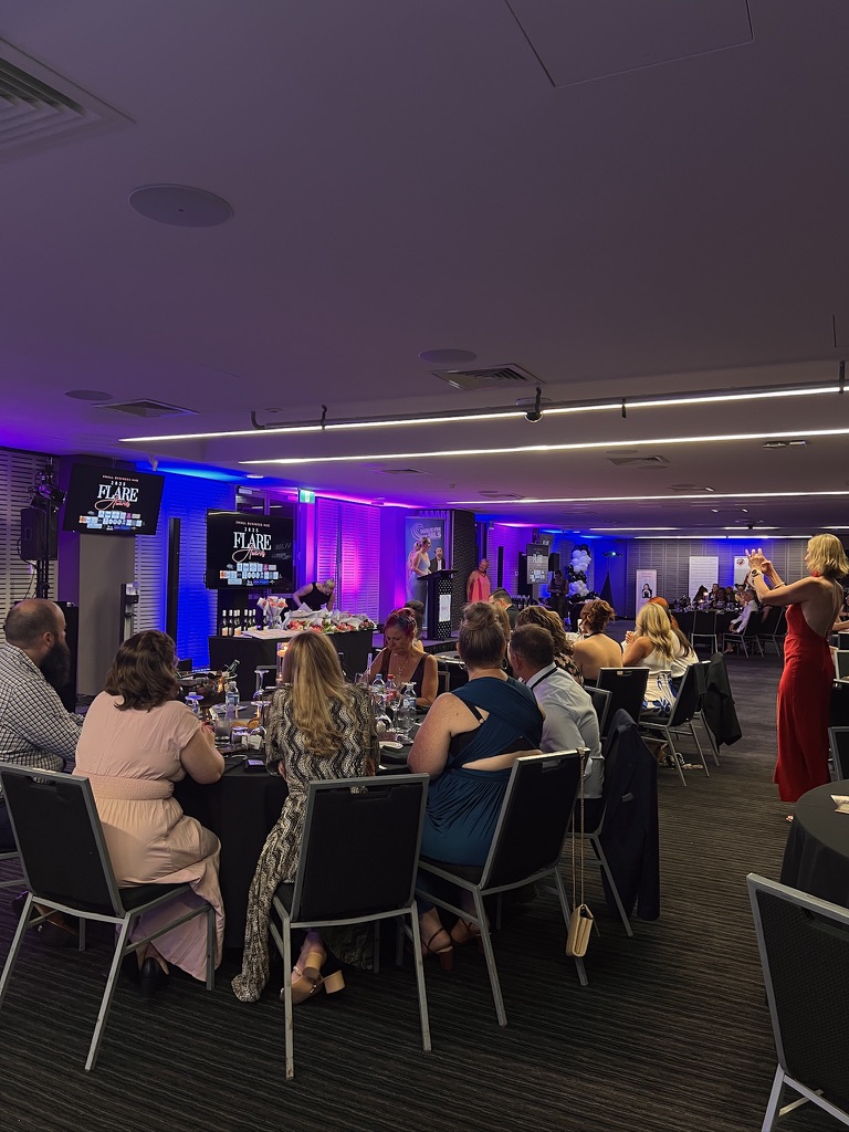 Guests seated at tables during the Flare Awards
