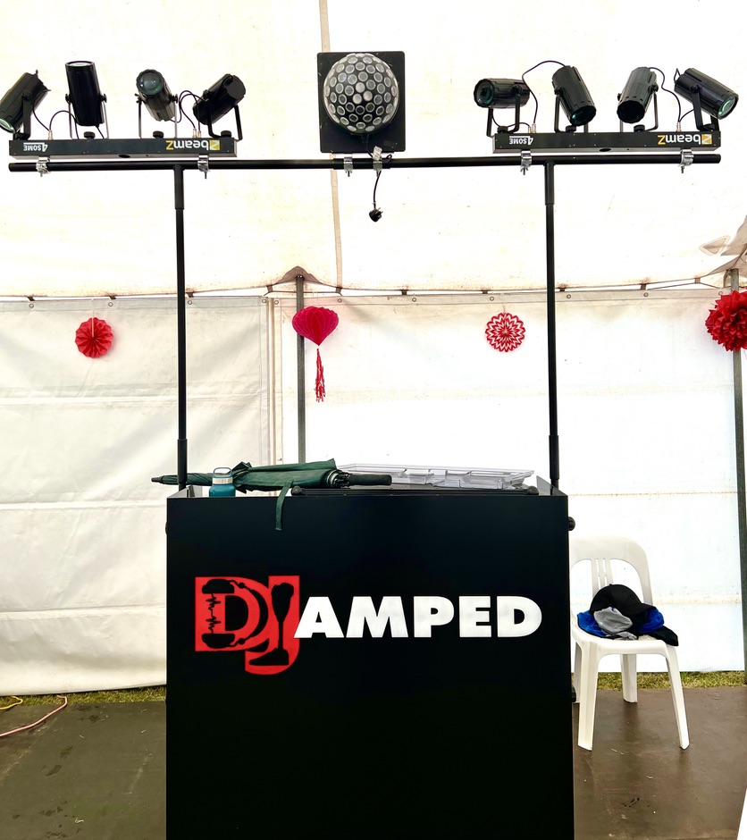 AMPT DJ booth and lighting prepared inside the marquee