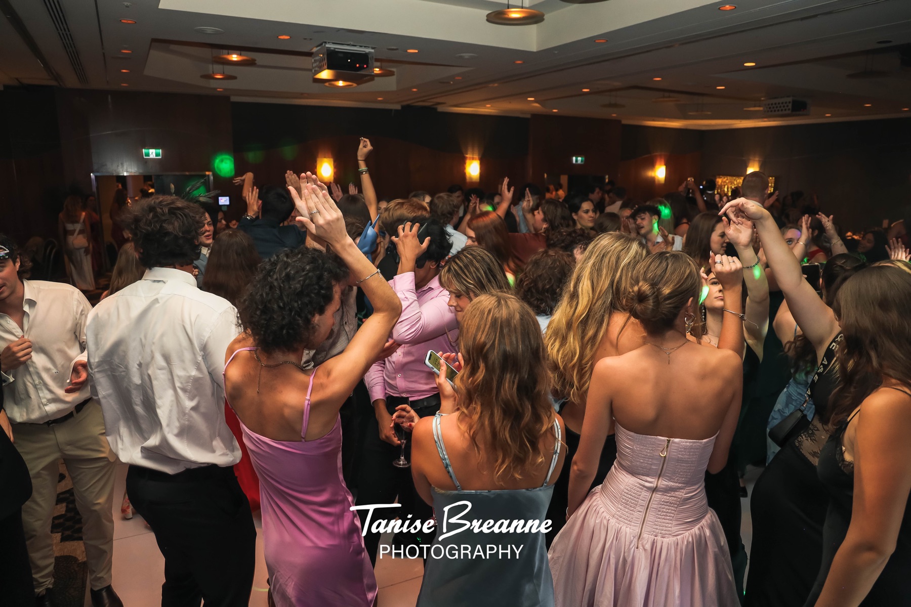 Crowd dancing together at the UOW Law Ball