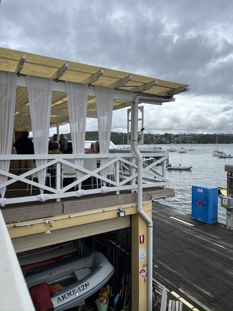 Covered waterfront terrace at Manly Yacht Club
