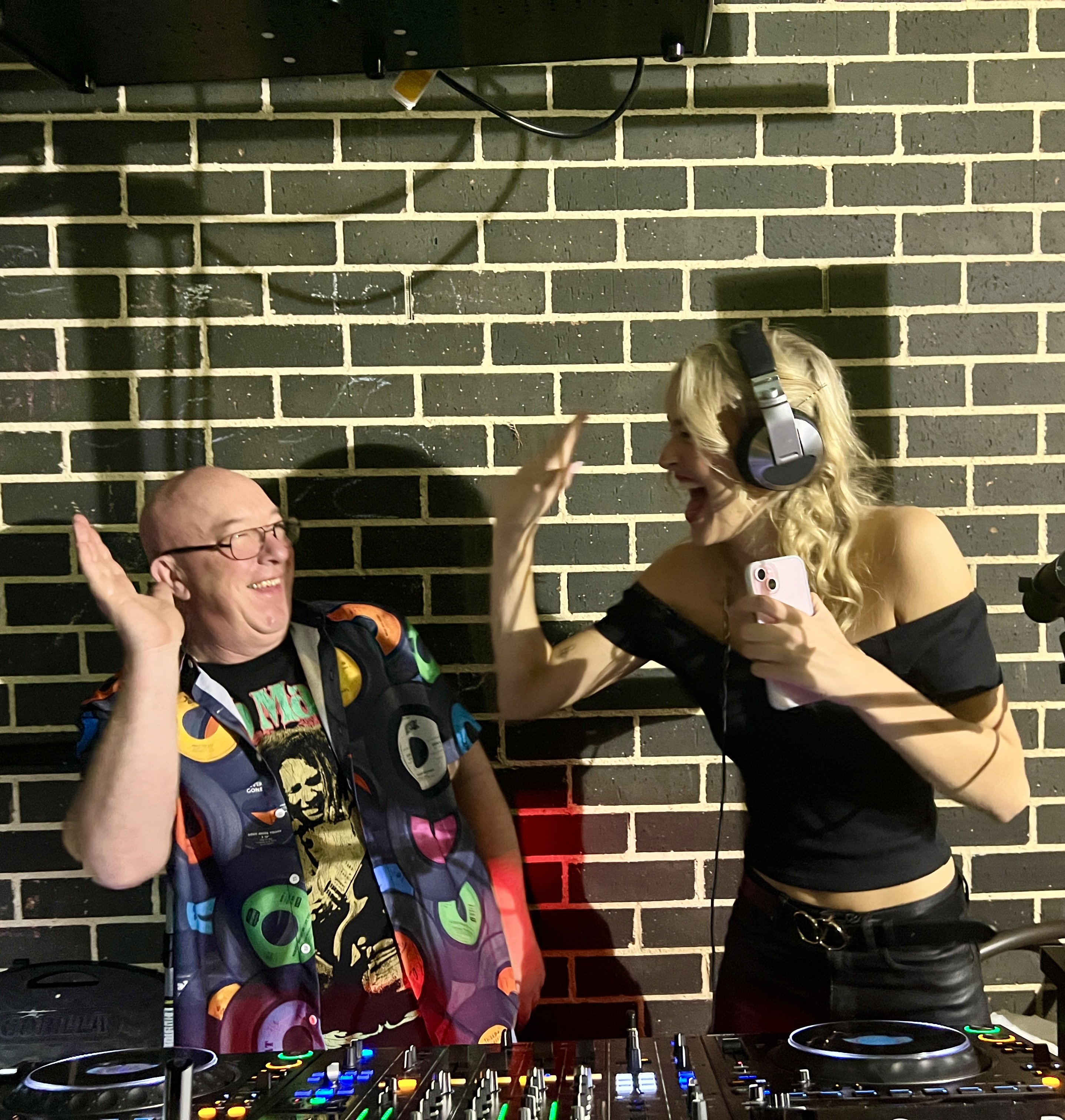 AMPT Australia and another DJ sharing a high five