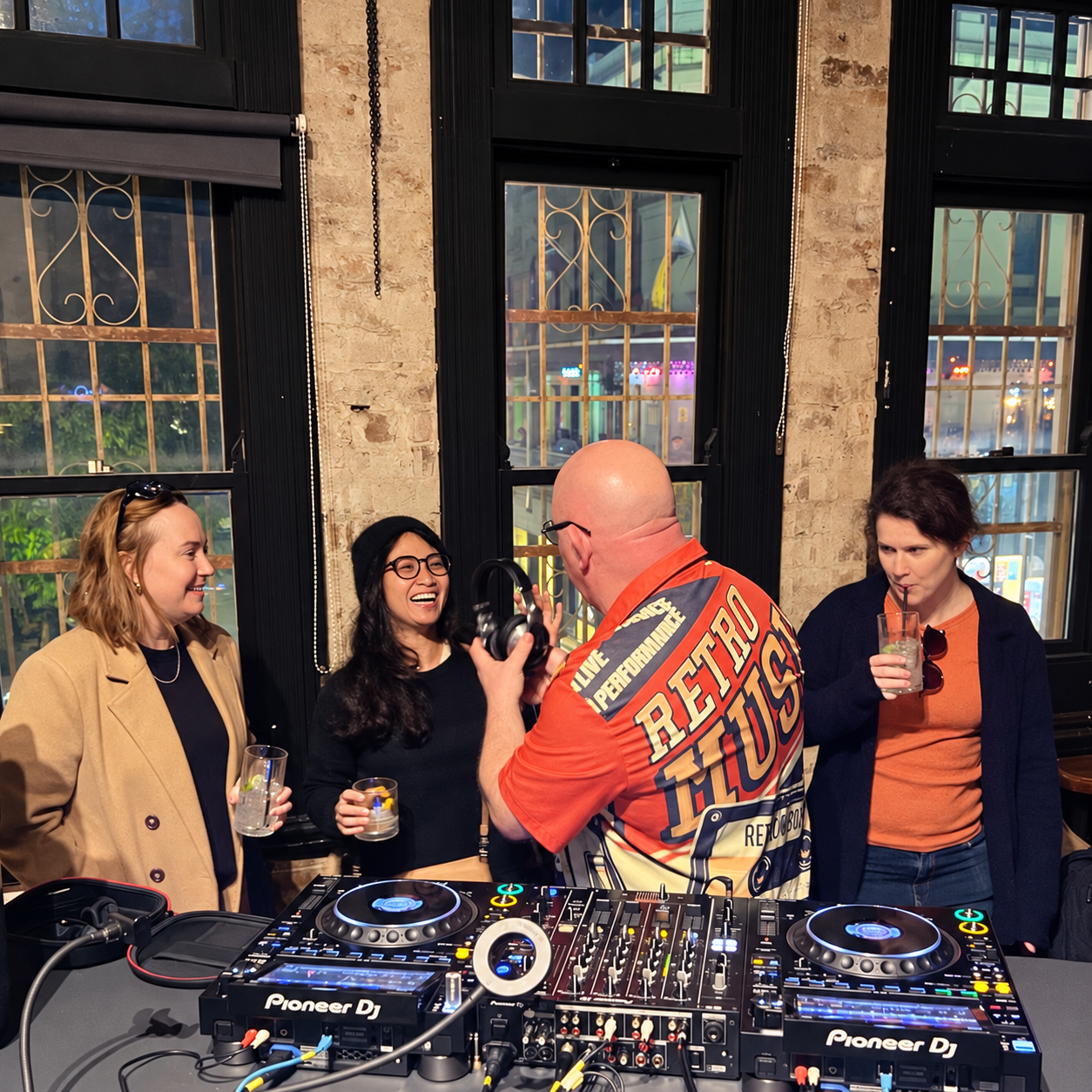 AMPT Australia welcoming guests behind the Pioneer DJ setup