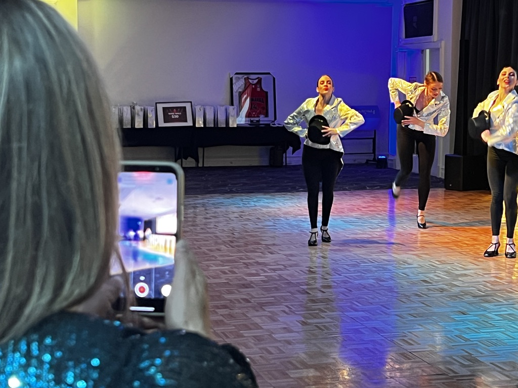 Guest recording the Showtime performance on a phone