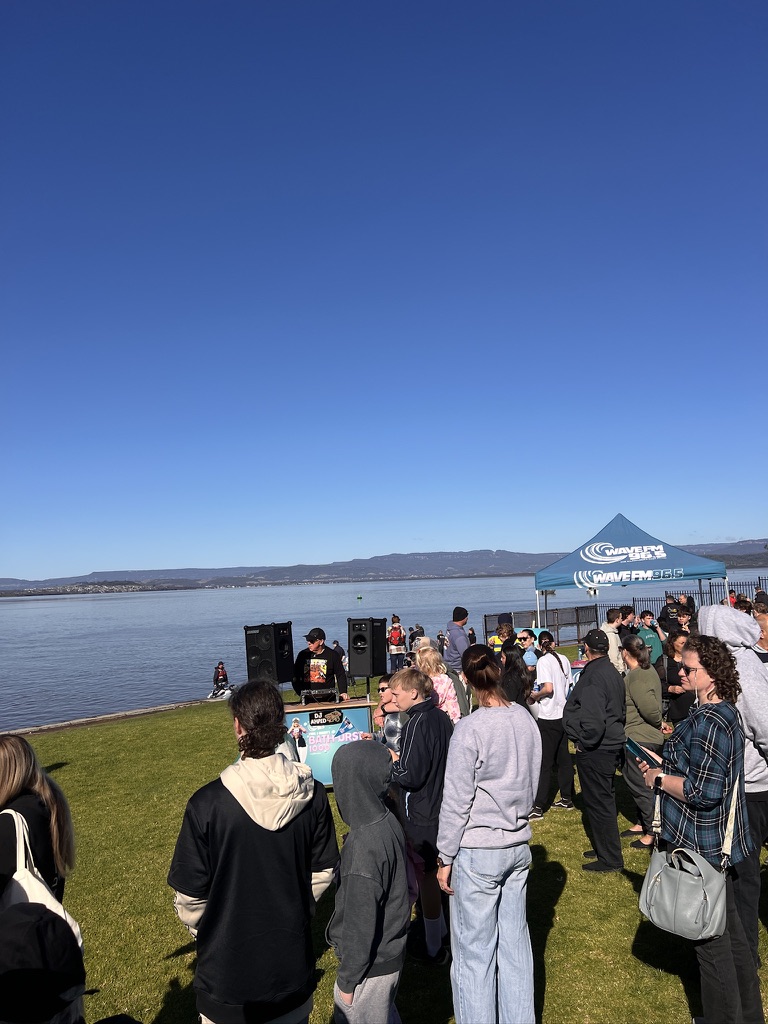 Wave FM event crowd gathered near AMPT Australia’s DJ setup