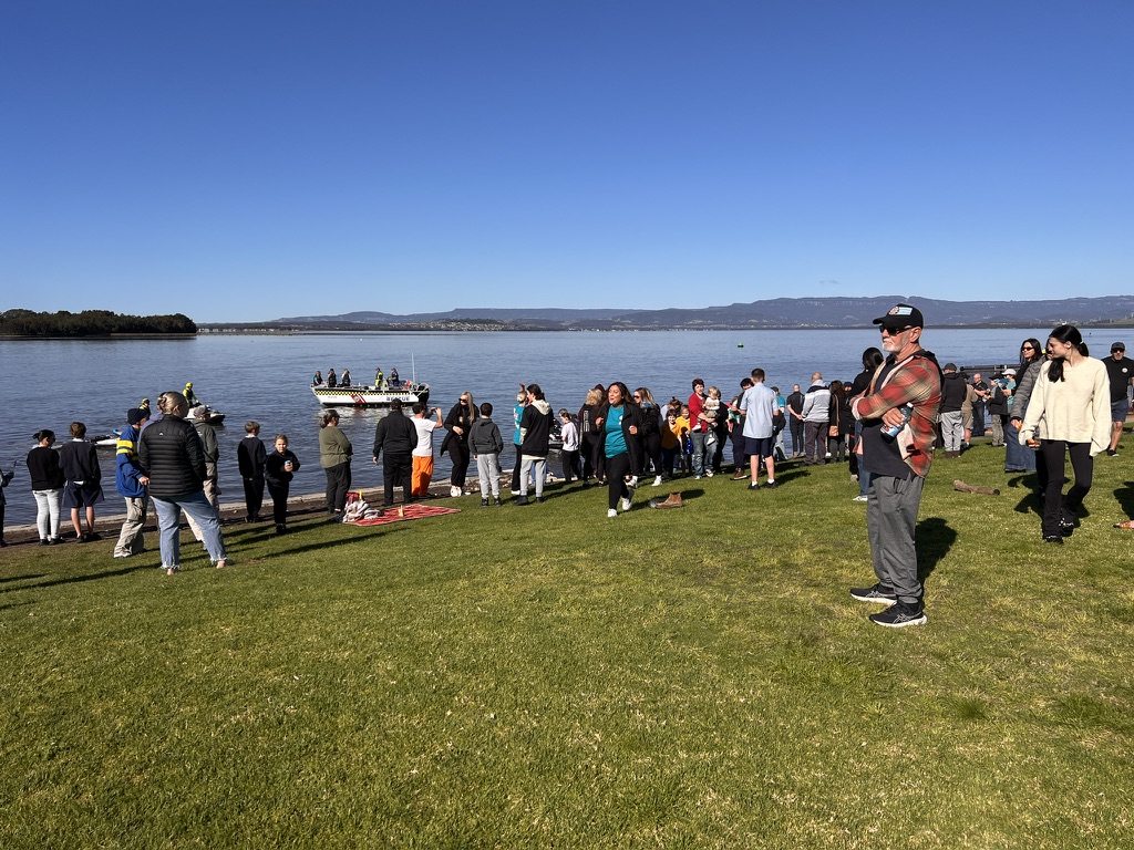 Guests gathered by the waterfront during the Wave FM event
