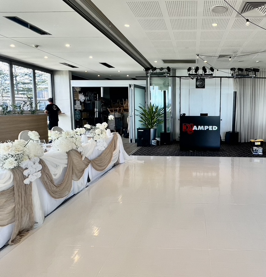AMPT Australia wedding DJ booth and lighting prepared at the venue
