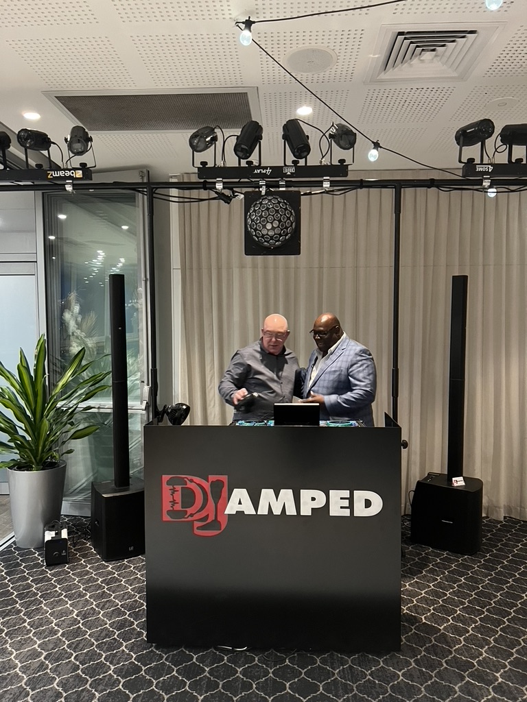 AMPT Australia speaking with wedding guest and DJ Carl Cox behind the DJ booth