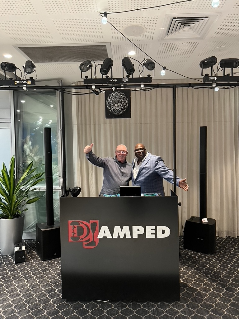 AMPT Australia and Carl Cox together behind the wedding DJ booth
