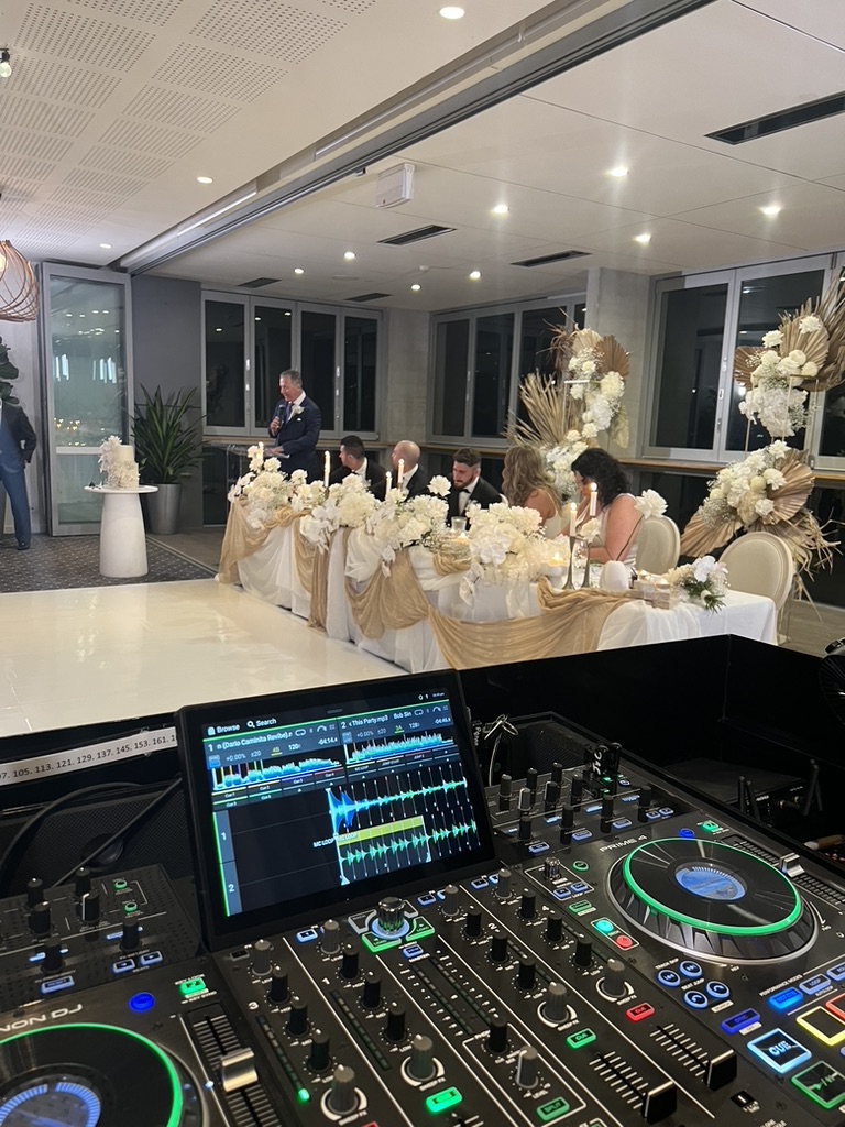 Wedding speeches seen from behind the DJ equipment